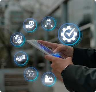 Person using a tablet with glowing digital icons representing supply chain, logistics, and manufacturing processes.