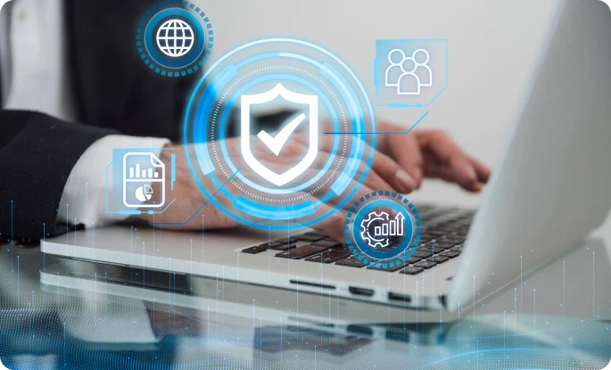 A businessman in a suit reviews a document while working on a laptop with a digital shield icon overlay.